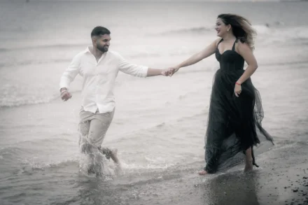 Elegant pre-wedding portrait of an South Asian couple at a beach