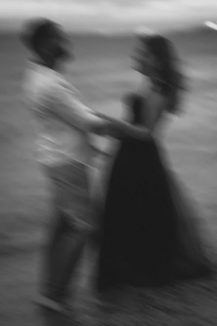 Elegant pre-wedding portrait of an South Asian couple at a beach