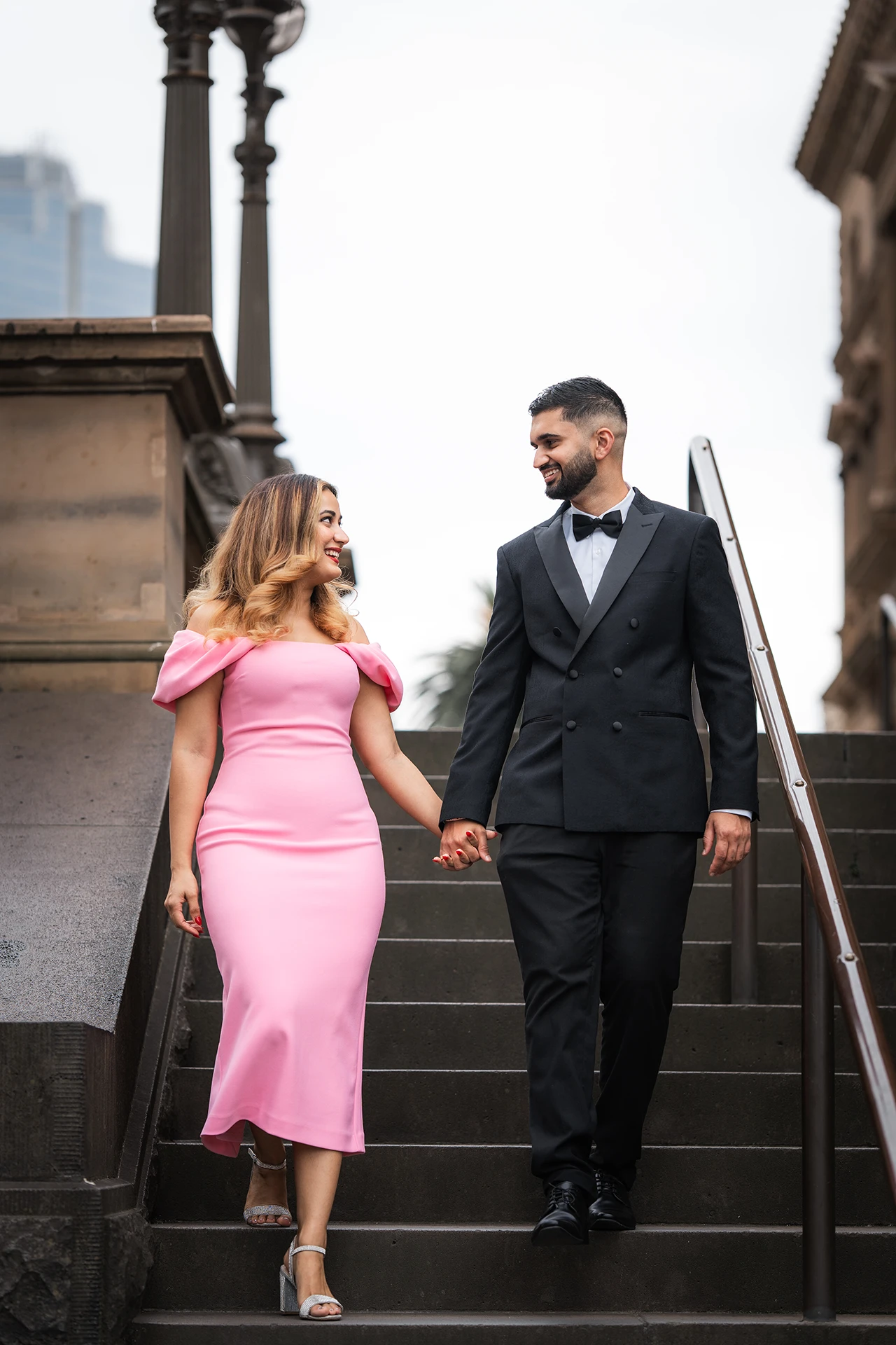 Elegant pre-wedding portrait of an Punjabi couple at Parliament in Melbourne