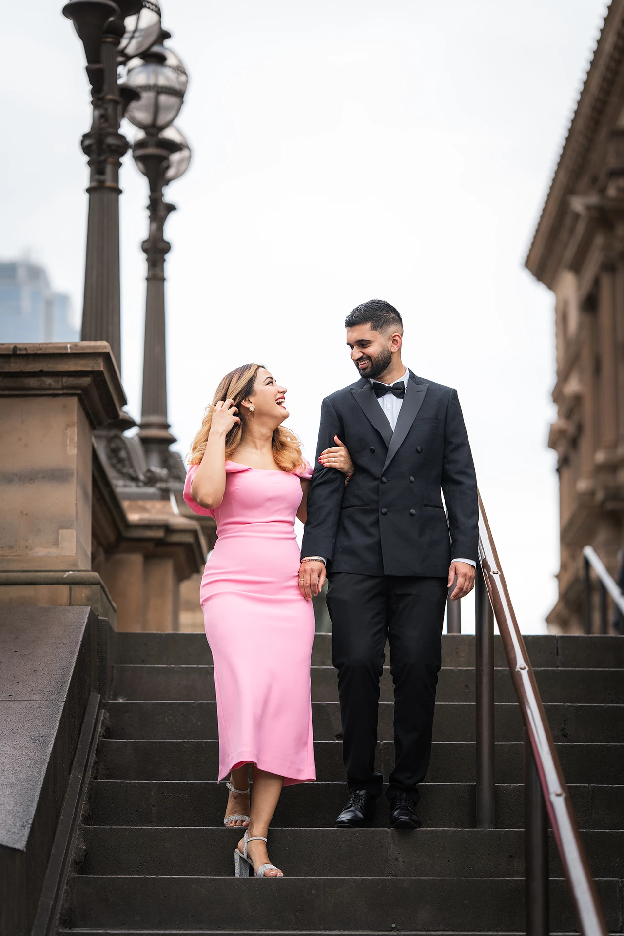 Elegant pre-wedding portrait of an Punjabi couple at Parliament in Melbourne