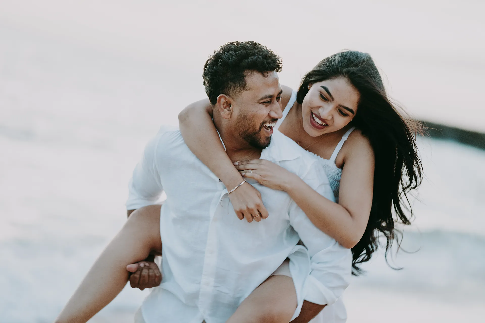 Romantic pre-wedding photoshoot on a Melbourne beach at sunset