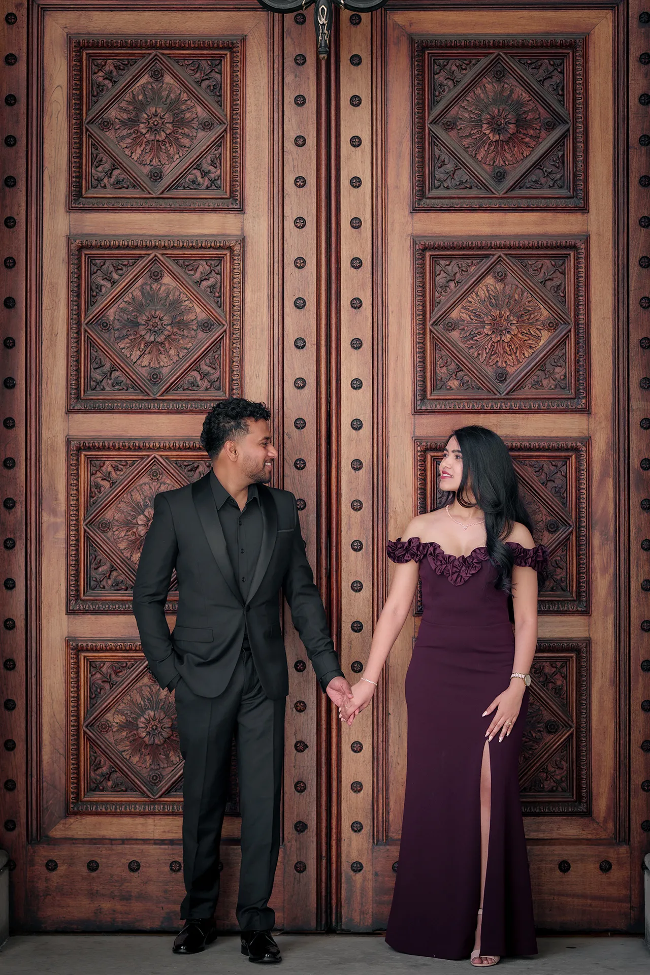 Elegant pre-wedding portrait of an Indian couple at Parliament in Melbourne